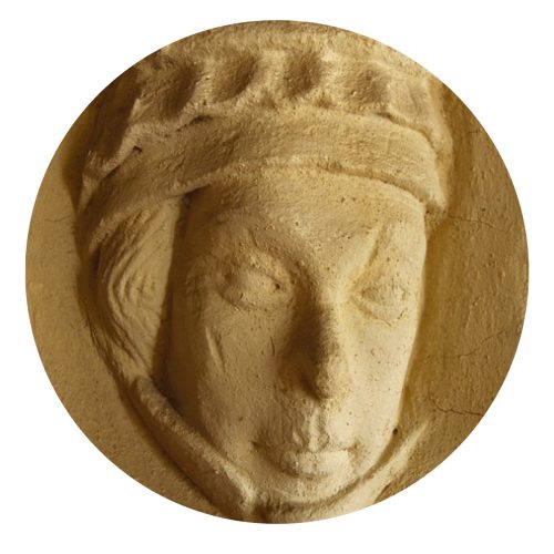 stone carving of face of Isabella